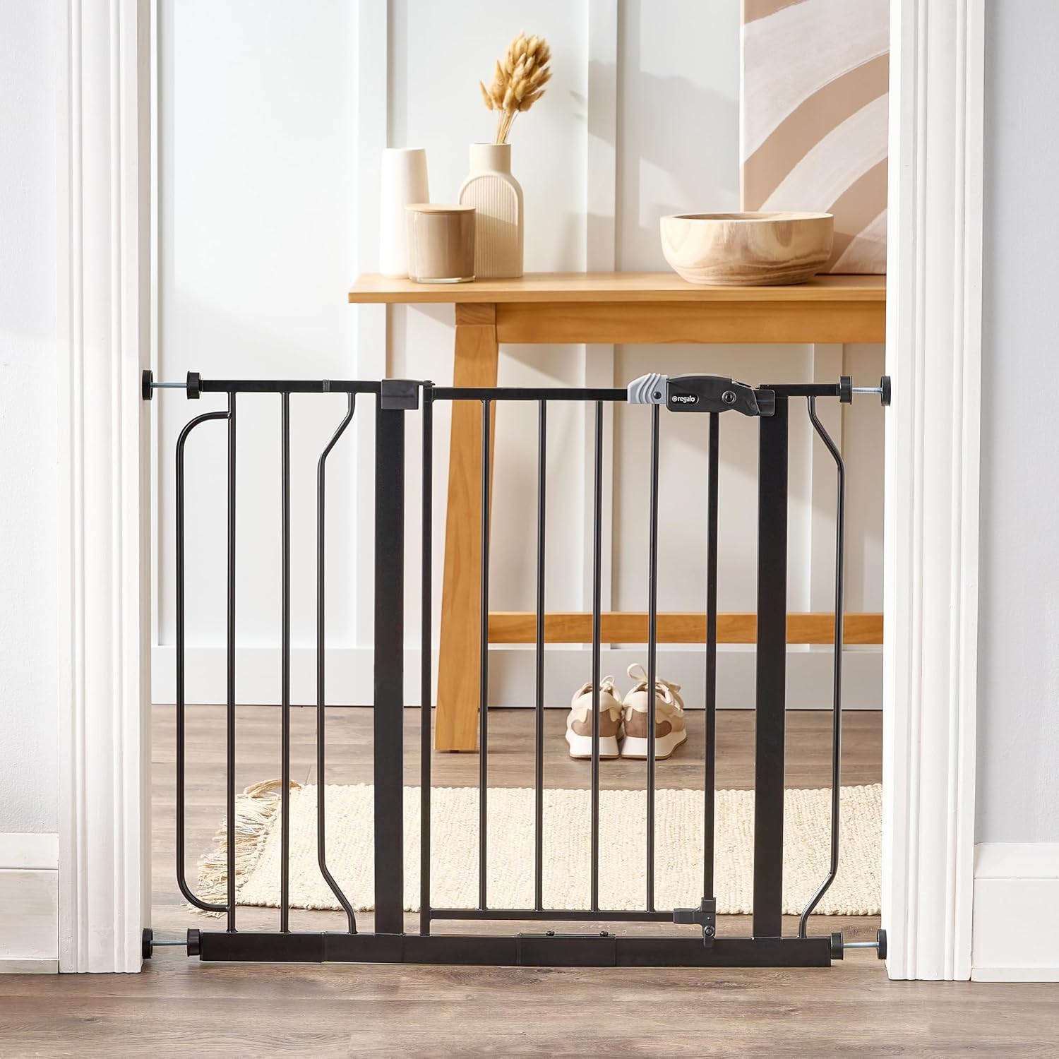 Regalo Safety 29"-49" Extra Wide Baby Gate, Bottom of Stairs & Doorways | Pressure Mounted with Door, For Babies, Toddlers & Pets, White, Tested & Trusted for 30 Years
