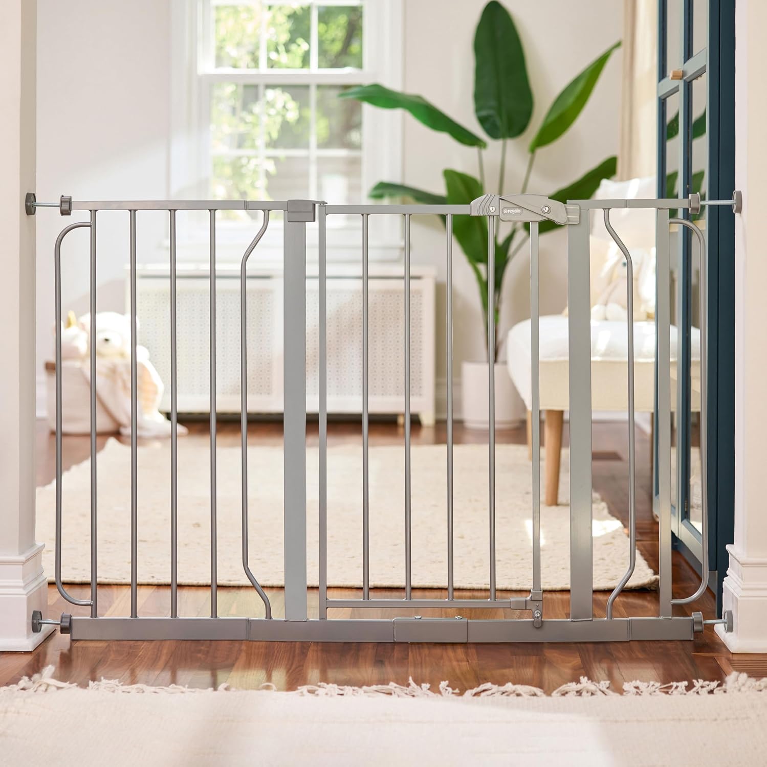 Regalo Safety 29"-49" Extra Wide Baby Gate, Bottom of Stairs & Doorways | Pressure Mounted with Door, For Babies, Toddlers & Pets, White, Tested & Trusted for 30 Years