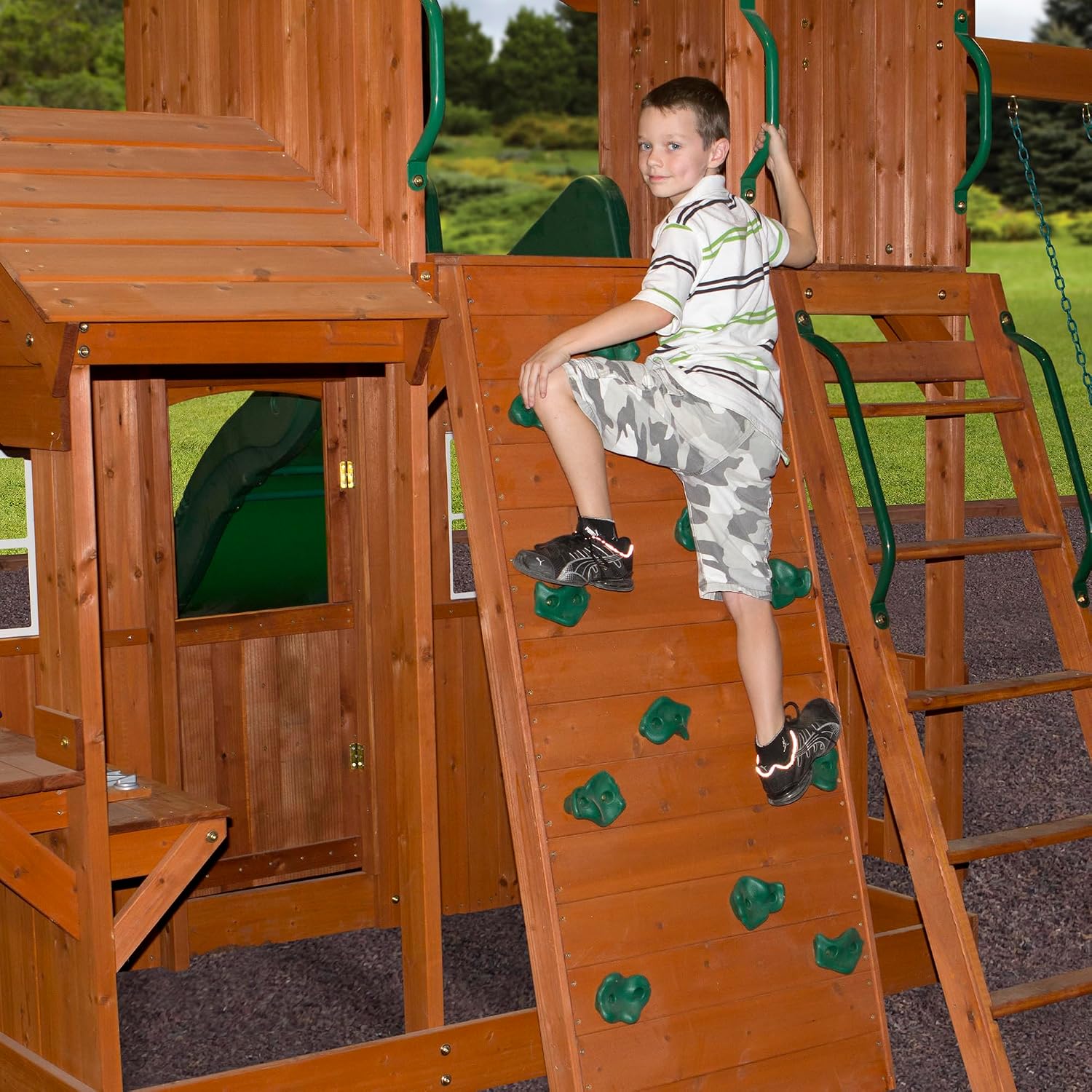Backyard Discovery Shenandoah Cedar Wood Swing Set with Wave Slide, Raised Clubhouse, Playhouse, Play Kitchen, Belt Swings, Trapeze, Rock Wall, Ladder