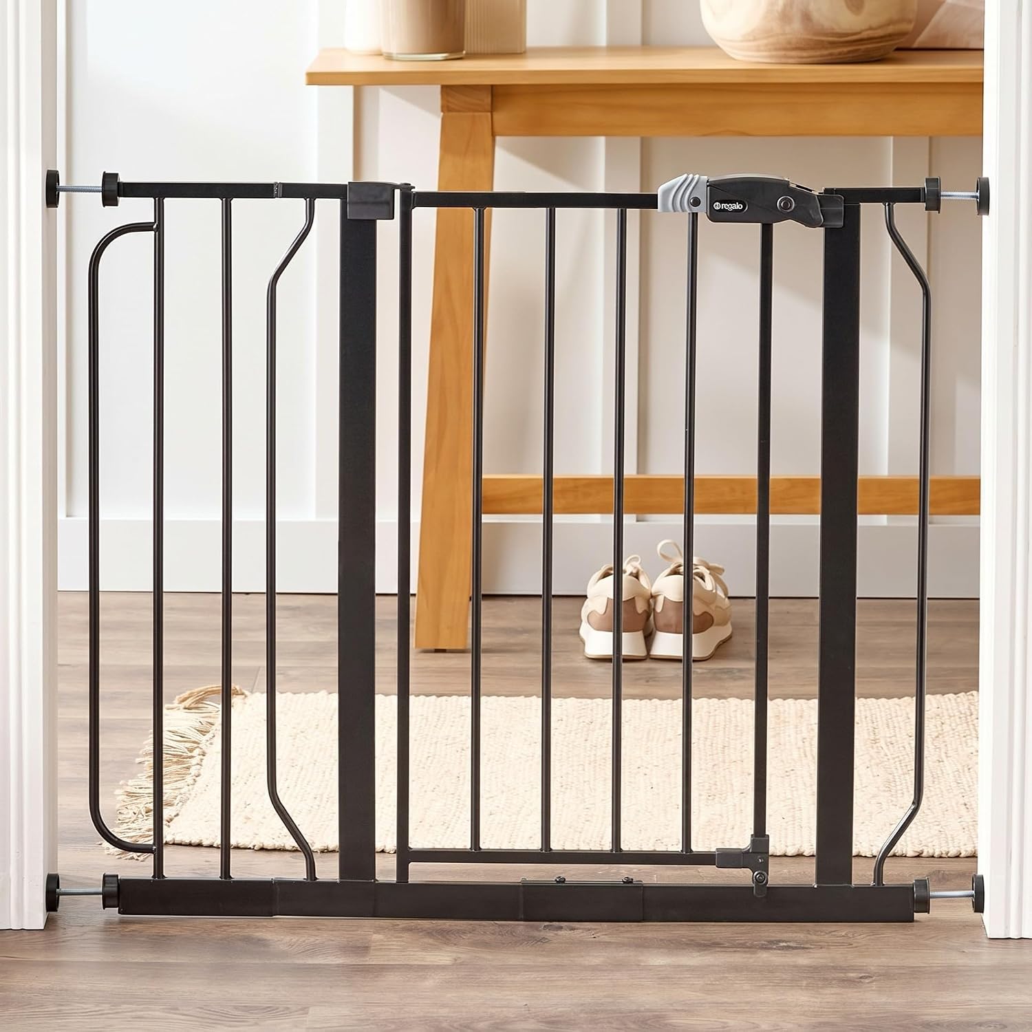 Regalo Safety 29"-49" Extra Wide Baby Gate, Bottom of Stairs & Doorways | Pressure Mounted with Door, For Babies, Toddlers & Pets, White, Tested & Trusted for 30 Years