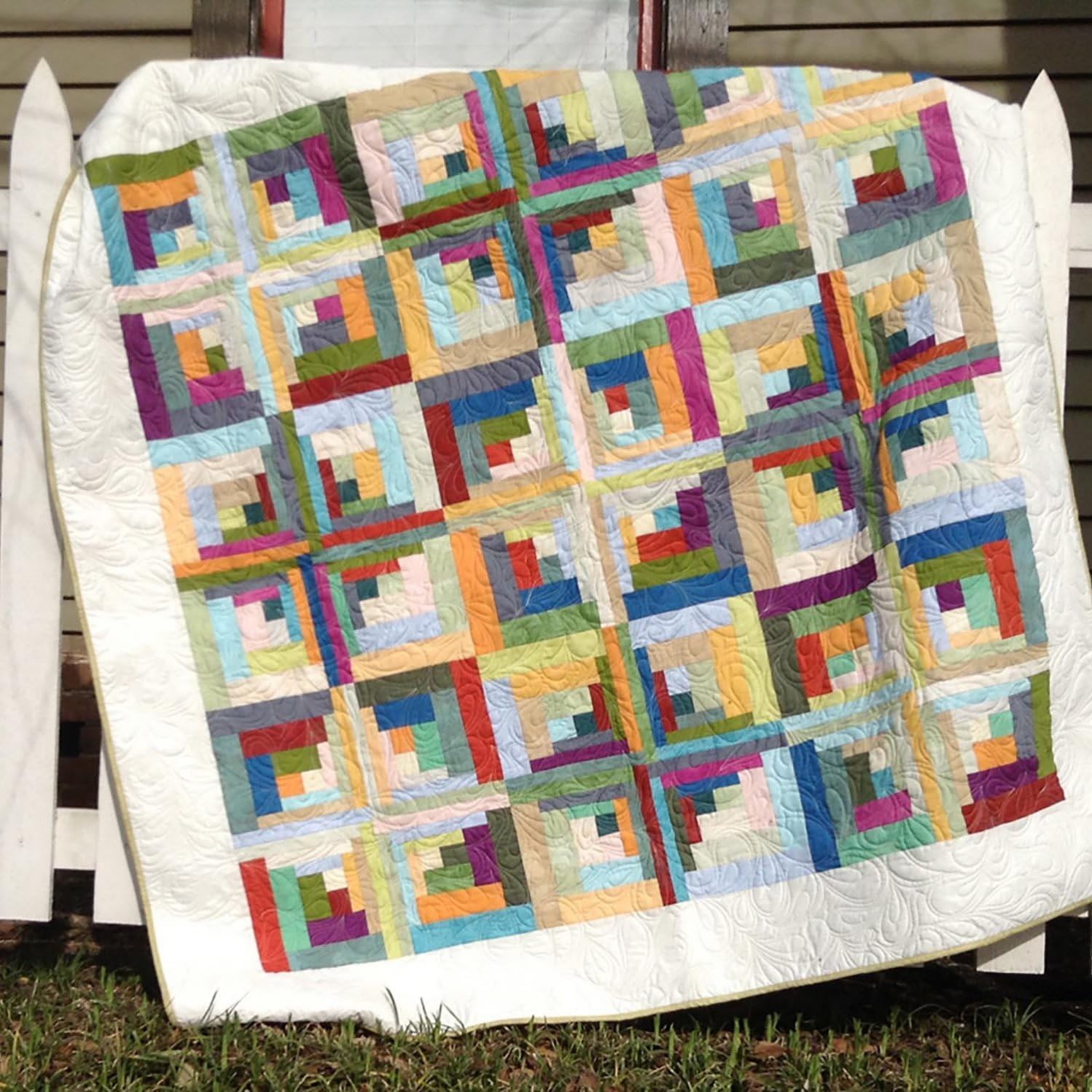 Bundle of Curvy Log Cabin Trim Tool 8in Finished Blocks and Cut Loose Press Carousel Curvy Log Cabin Quilt Pattern