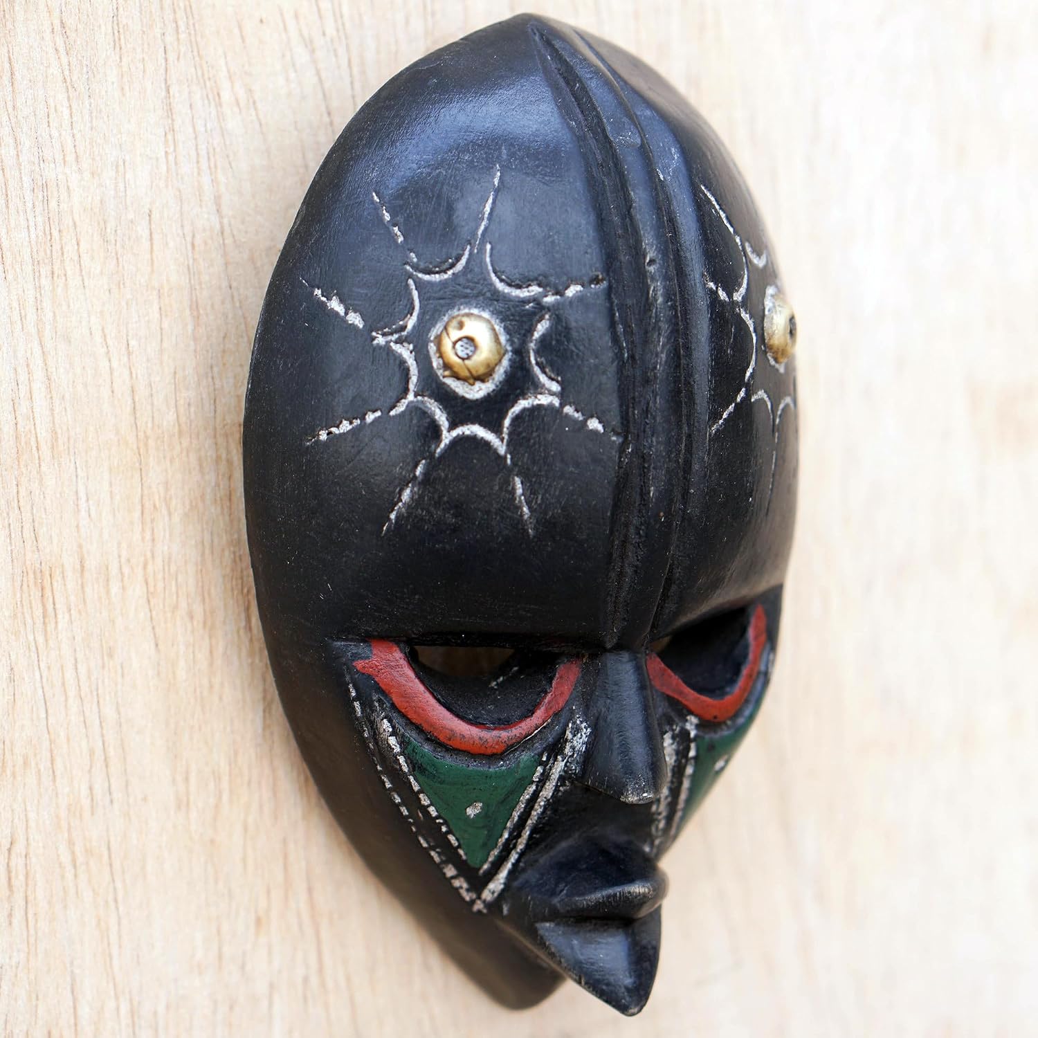 NOVICA Artisan Handcarved African Wood Mask Sese Wall from Ghana Black Multicolor Woodbrass Masks Ghanaian [5.75in H x 3in W x 1.4in D] ' Stellar