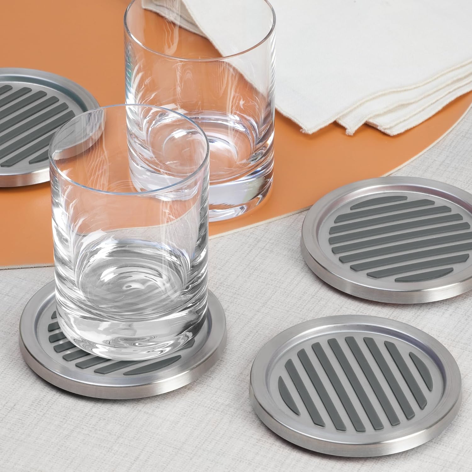 iDesign Forma Brushed Stainless Steel Drink Coasters for Home Counters, Kitchen, Dining Room, Living Room, Patio, Coffee Table, Set of 4, Black