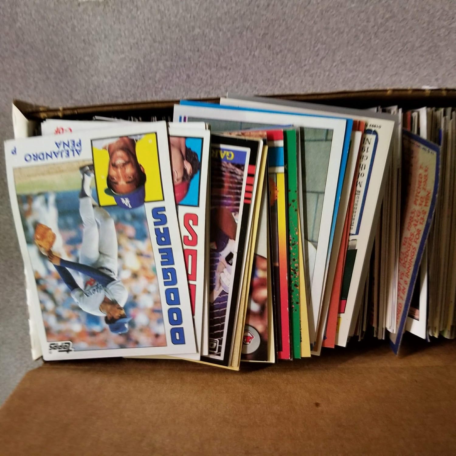 600 Baseball Cards Including Babe Ruth, Unopened Packs, Many Stars, and Hall-of-Famers. Ships in White Box Perfect for Gift Giving.