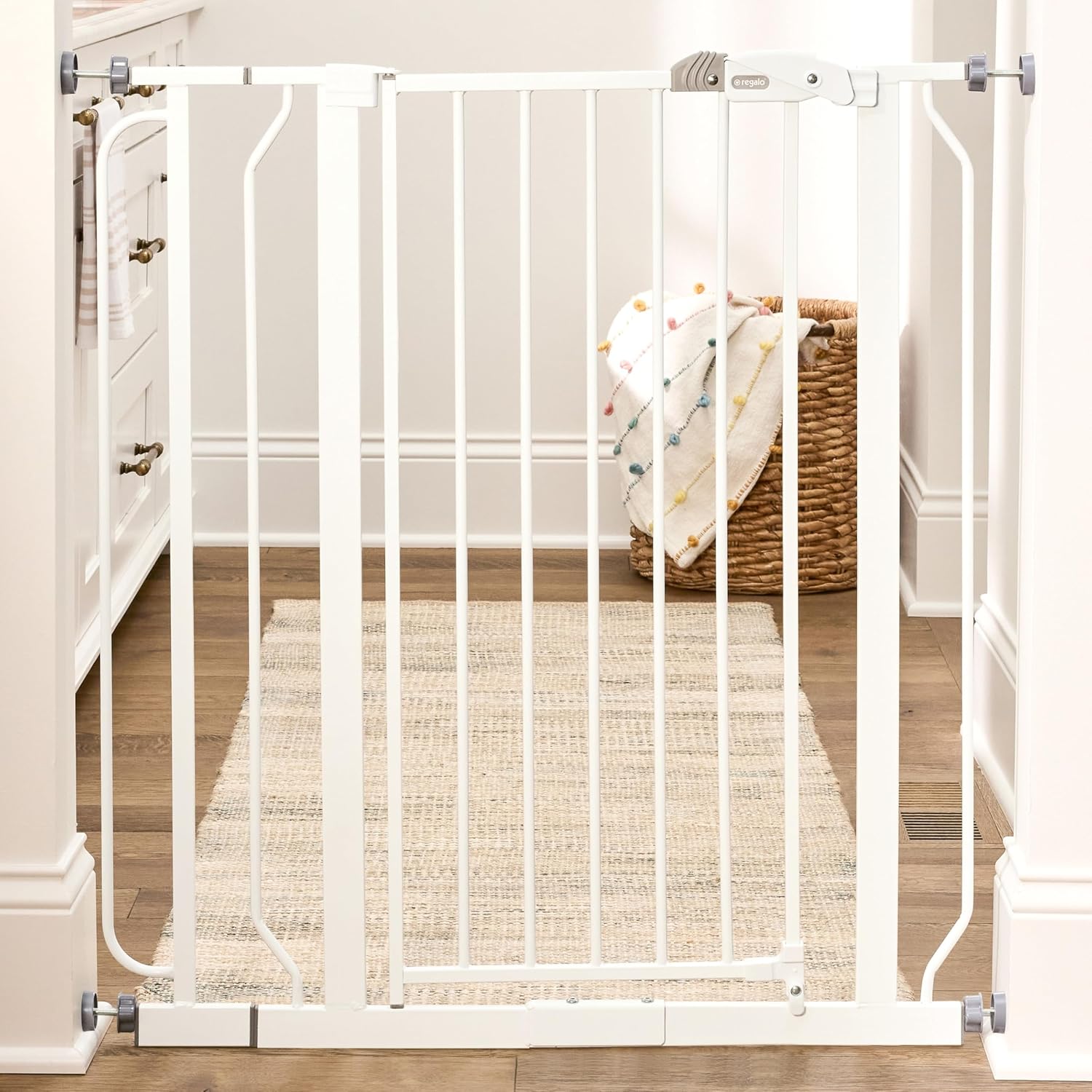 Regalo Safety 29"-49" Extra Wide Baby Gate, Bottom of Stairs & Doorways | Pressure Mounted with Door, For Babies, Toddlers & Pets, White, Tested & Trusted for 30 Years