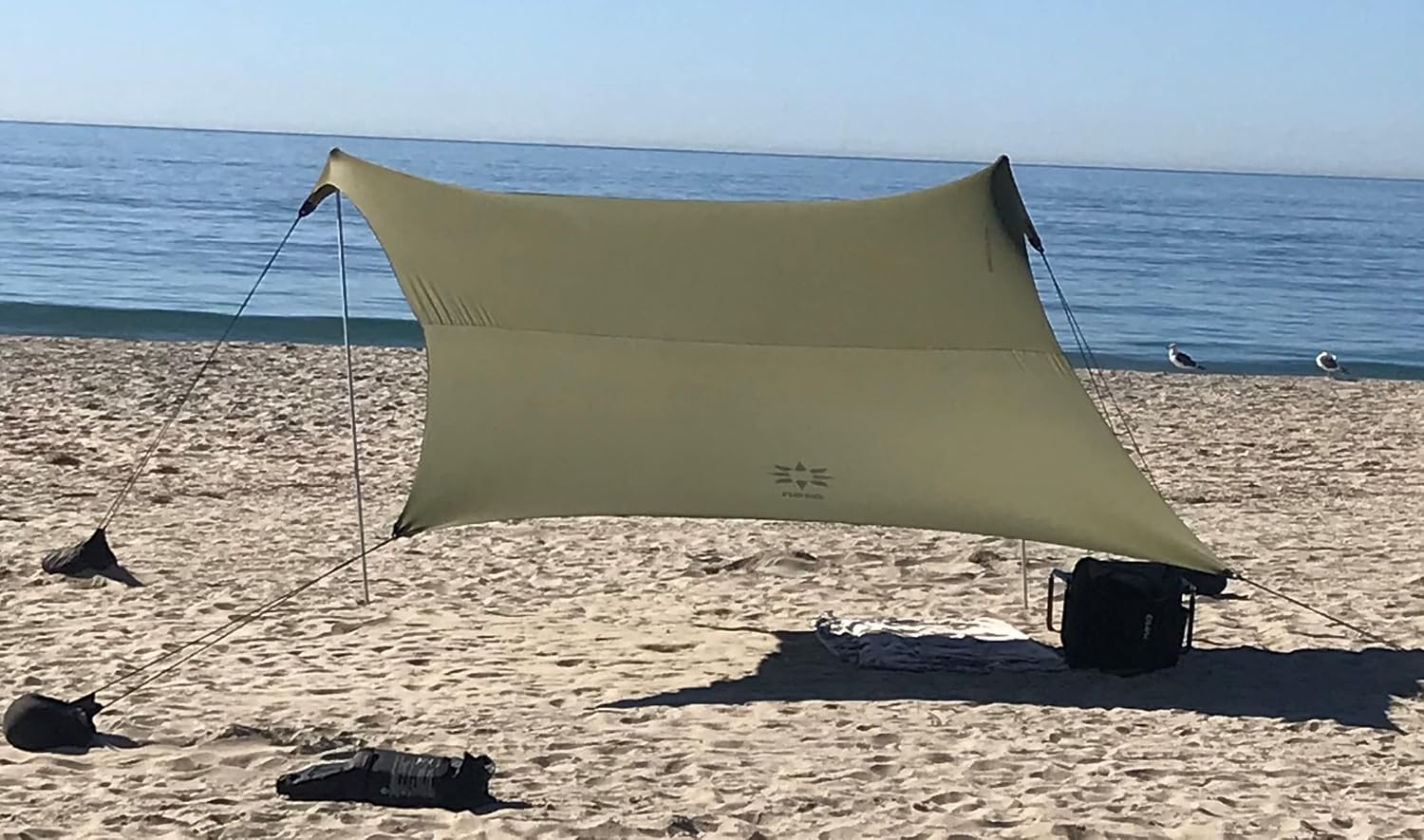 Neso Portable Beach Tent Sun Shelter with Sand Anchor - Lightweight Beach Shade Canopy - Easy Setup for Family Outings - Patented Reinforced Corners - UPF 50+ Sun Protection - 7 x 7ft - White