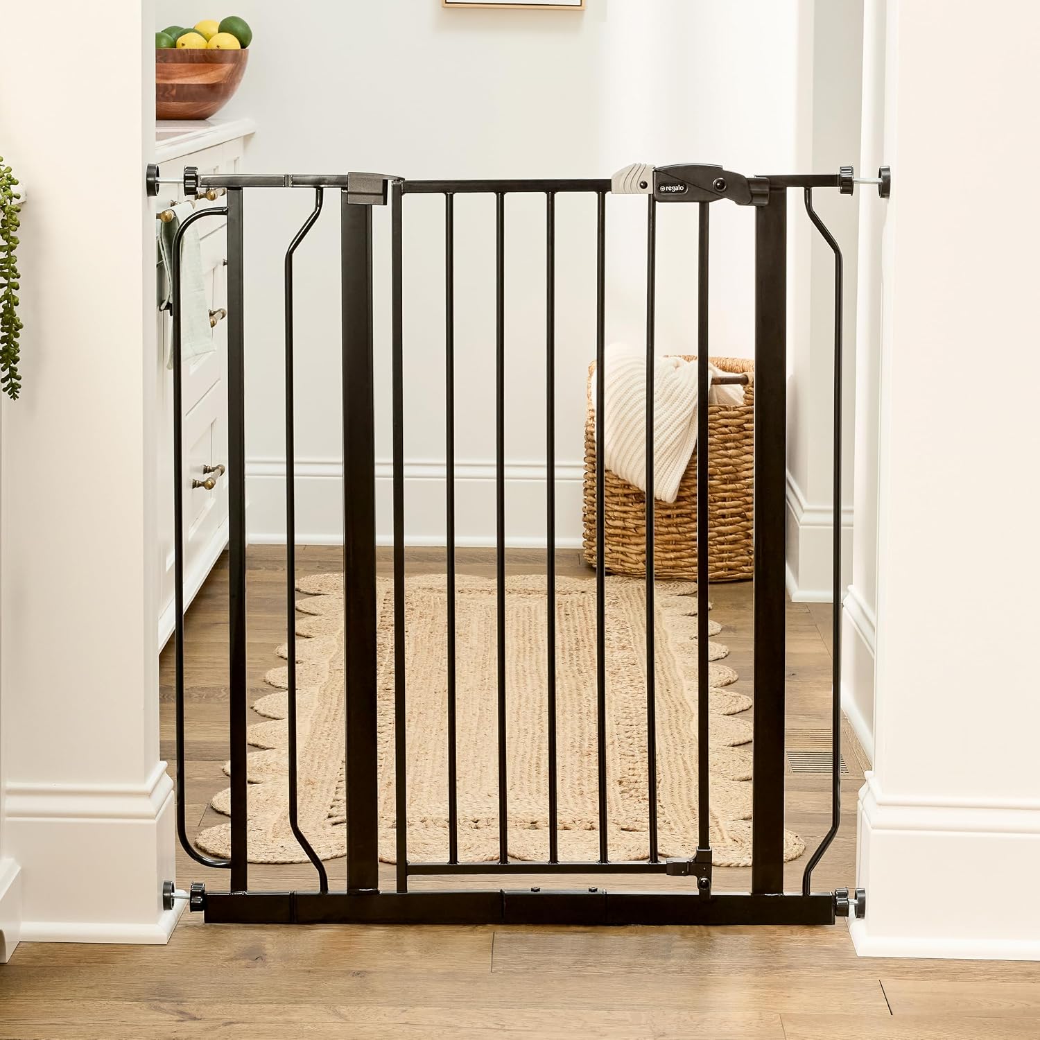 Regalo Safety 29"-49" Extra Wide Baby Gate, Bottom of Stairs & Doorways | Pressure Mounted with Door, For Babies, Toddlers & Pets, White, Tested & Trusted for 30 Years