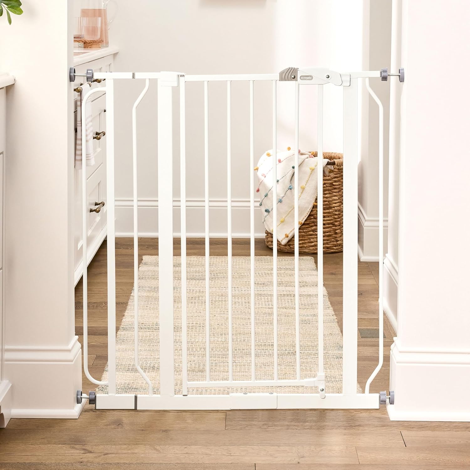 Regalo Safety 29"-49" Extra Wide Baby Gate, Bottom of Stairs & Doorways | Pressure Mounted with Door, For Babies, Toddlers & Pets, White, Tested & Trusted for 30 Years