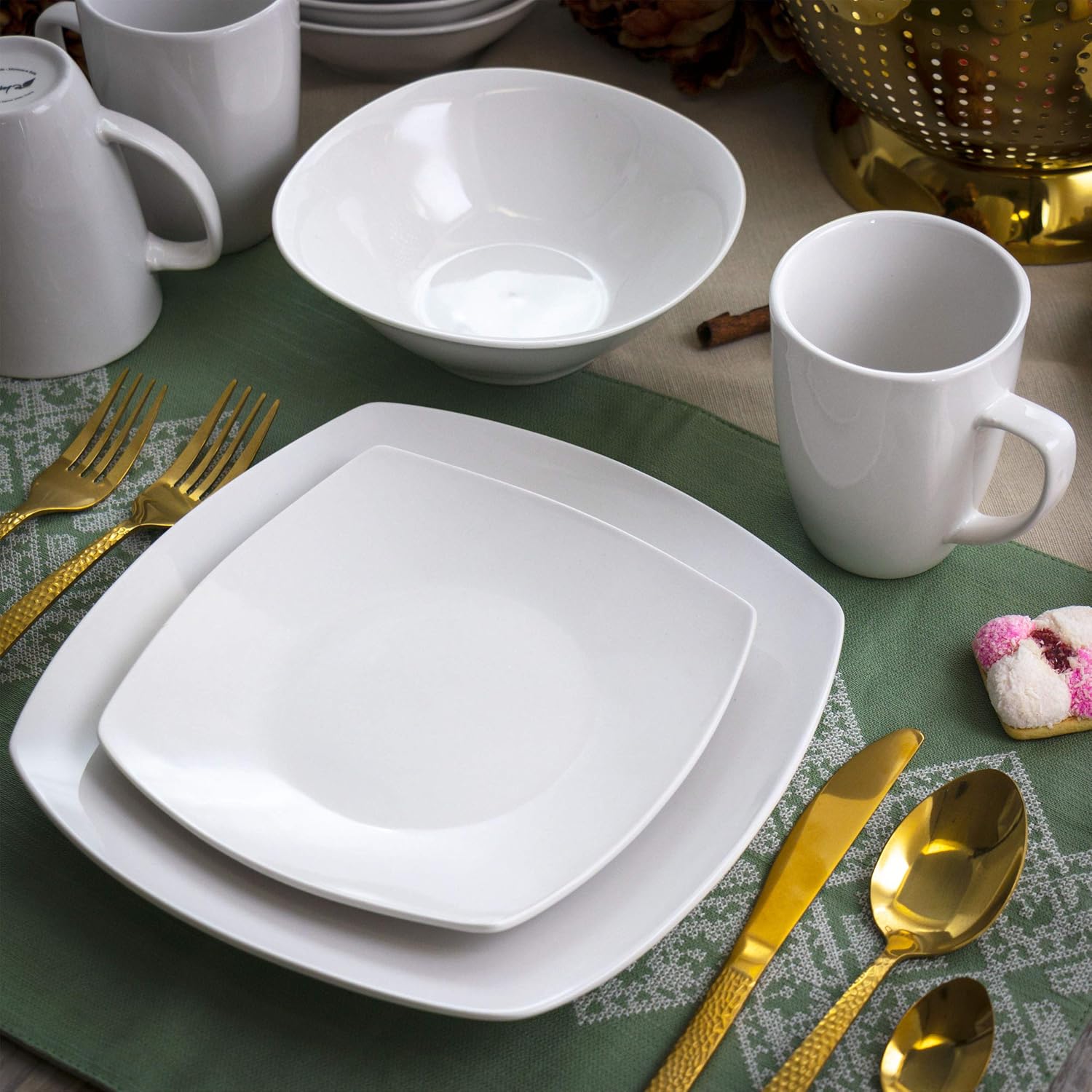 Elama Cara 16 Piece Round Porcelain Dinnerware Set in White