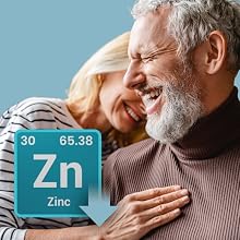 Mature couple laughing with low zinc graphic