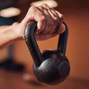 Person holding Kettlebell