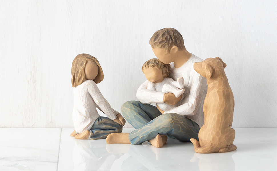 Various Willow Tree figures composed in a family setting.