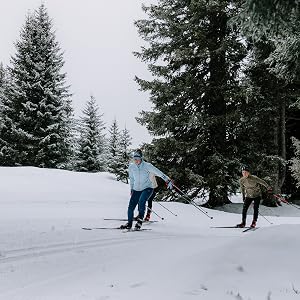 two men cross-country skiing