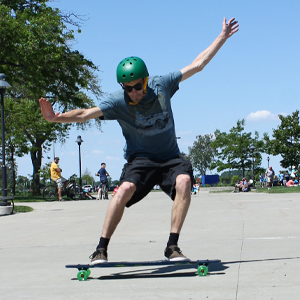 Sliding on a longboard wearing a Krown Helmet