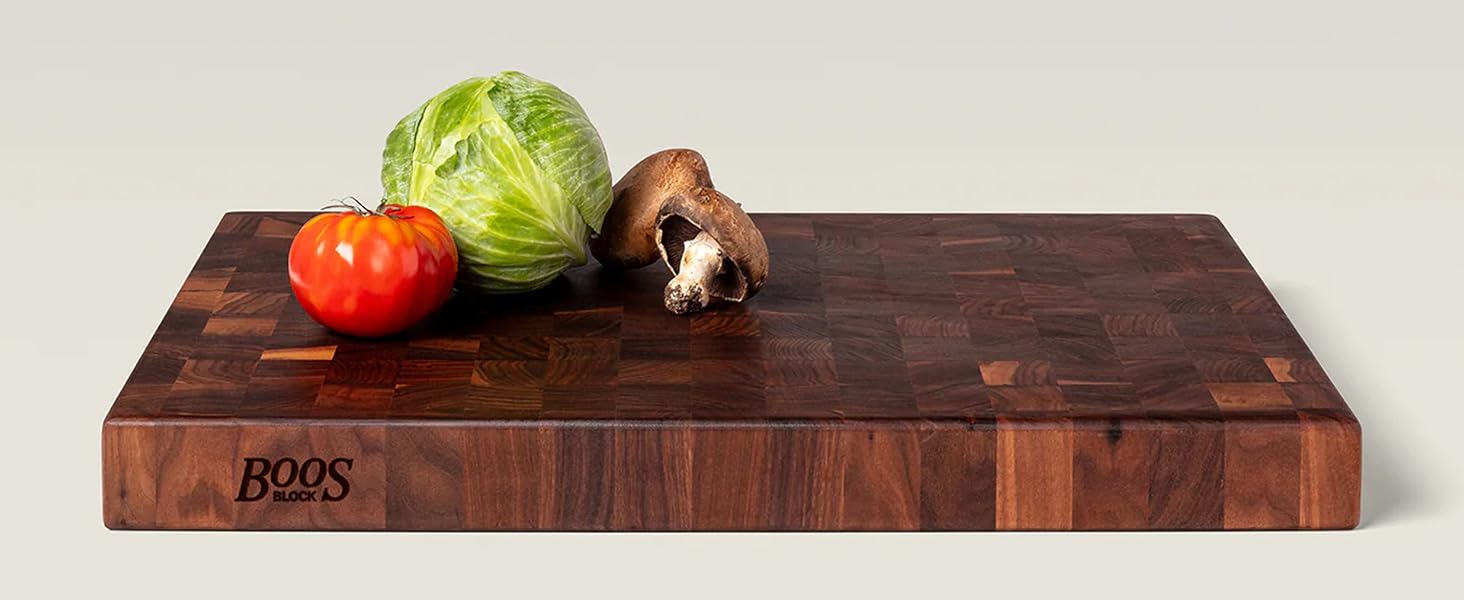 Lifestyle image of Boos Block walnut chopping block w/ veggies.