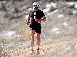 Athlete running on a trail fueled by Re-Lyte Hydration for endurance and performance support.