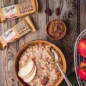 bow of oatmeal with apple slices and bobs red mill chocolate bar