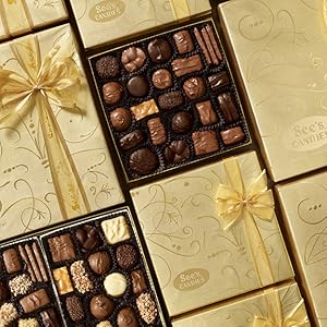 Gold boxes of chocolates in a row