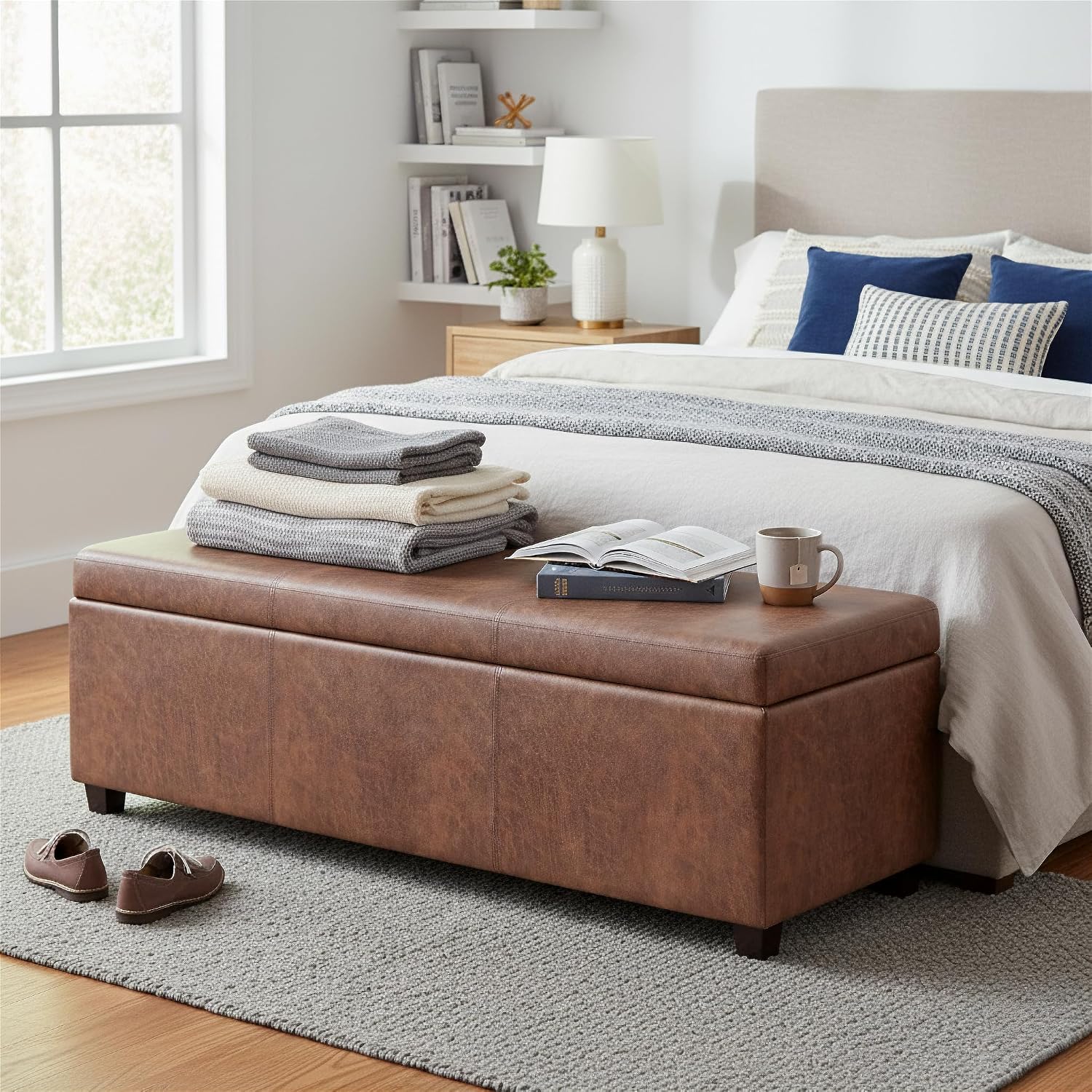 SIMPLIHOME Avalon 54" Wide Vegan Leather Storage Ottoman in Tanners Brown