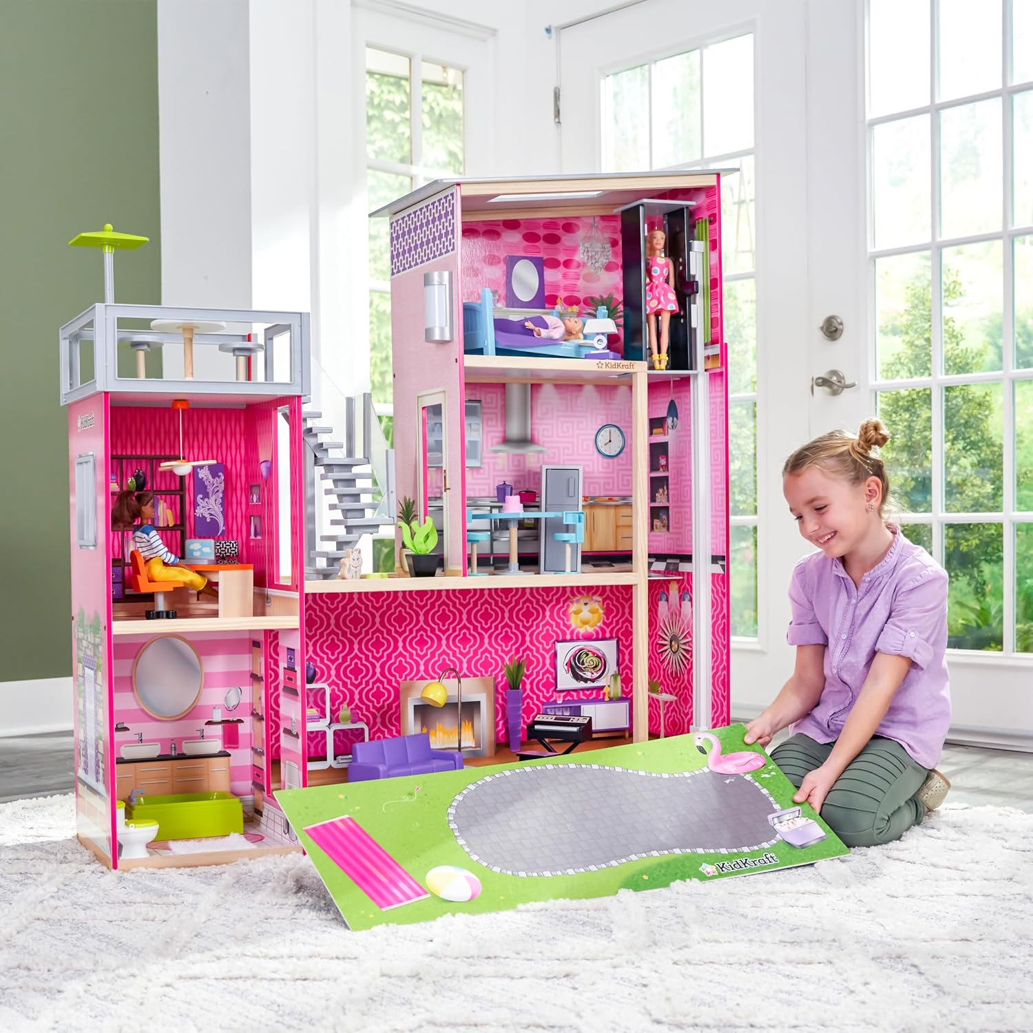 KidKraft Uptown Wooden Modern Dollhouse with Lights & Sounds, Pool and 36 Accessories | Over 3 Feet Tall Pink Mansion Doll House, Working Elevator