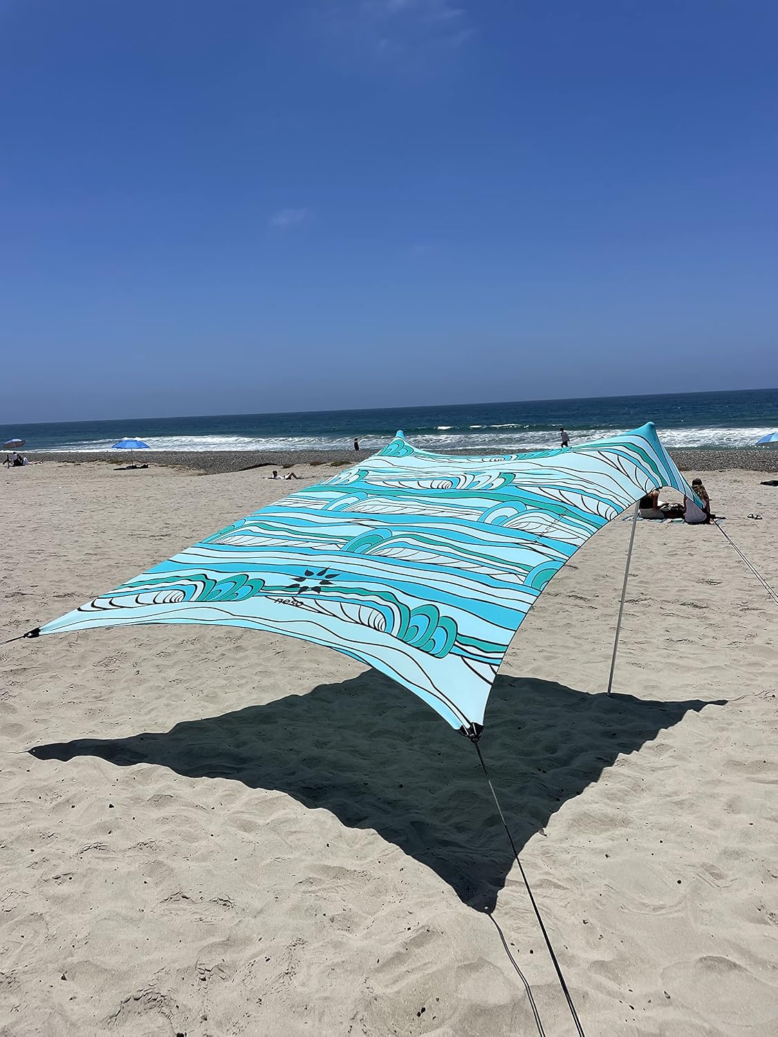 Neso Portable Beach Tent Sun Shelter with Sand Anchor - Lightweight Beach Shade Canopy - Easy Setup for Family Outings - Patented Reinforced Corners - UPF 50+ Sun Protection - 7 x 7ft - White