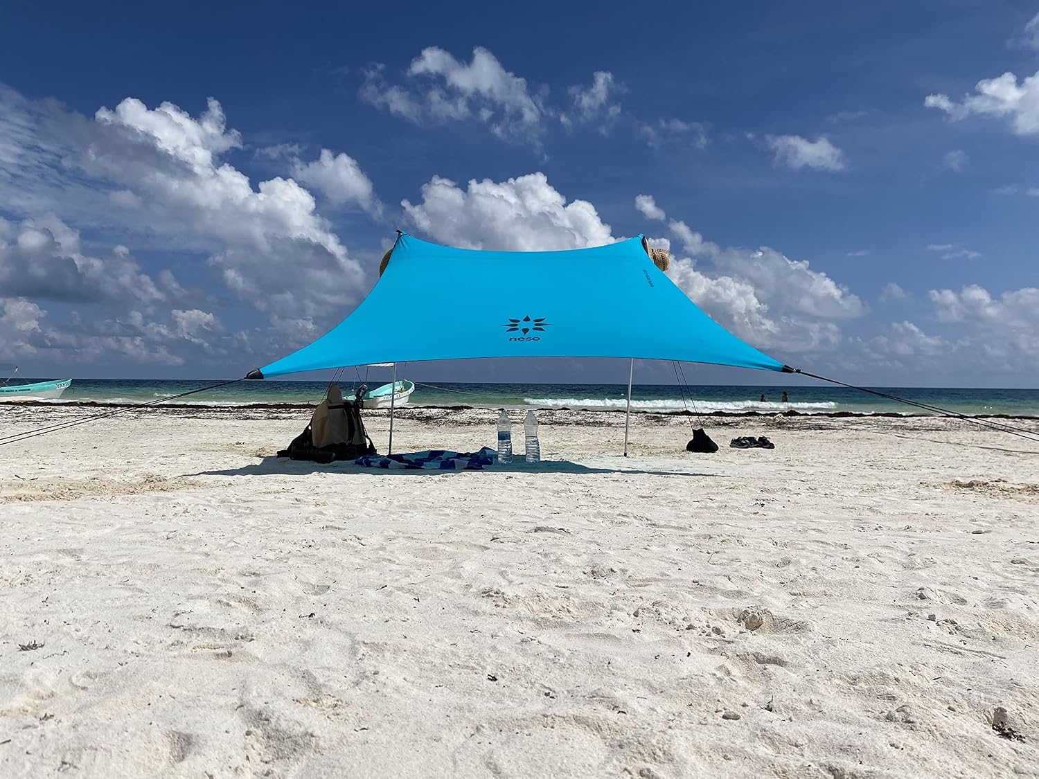 Neso Portable Beach Tent Sun Shelter with Sand Anchor - Lightweight Beach Shade Canopy - Easy Setup for Family Outings - Patented Reinforced Corners - UPF 50+ Sun Protection - 7 x 7ft - White