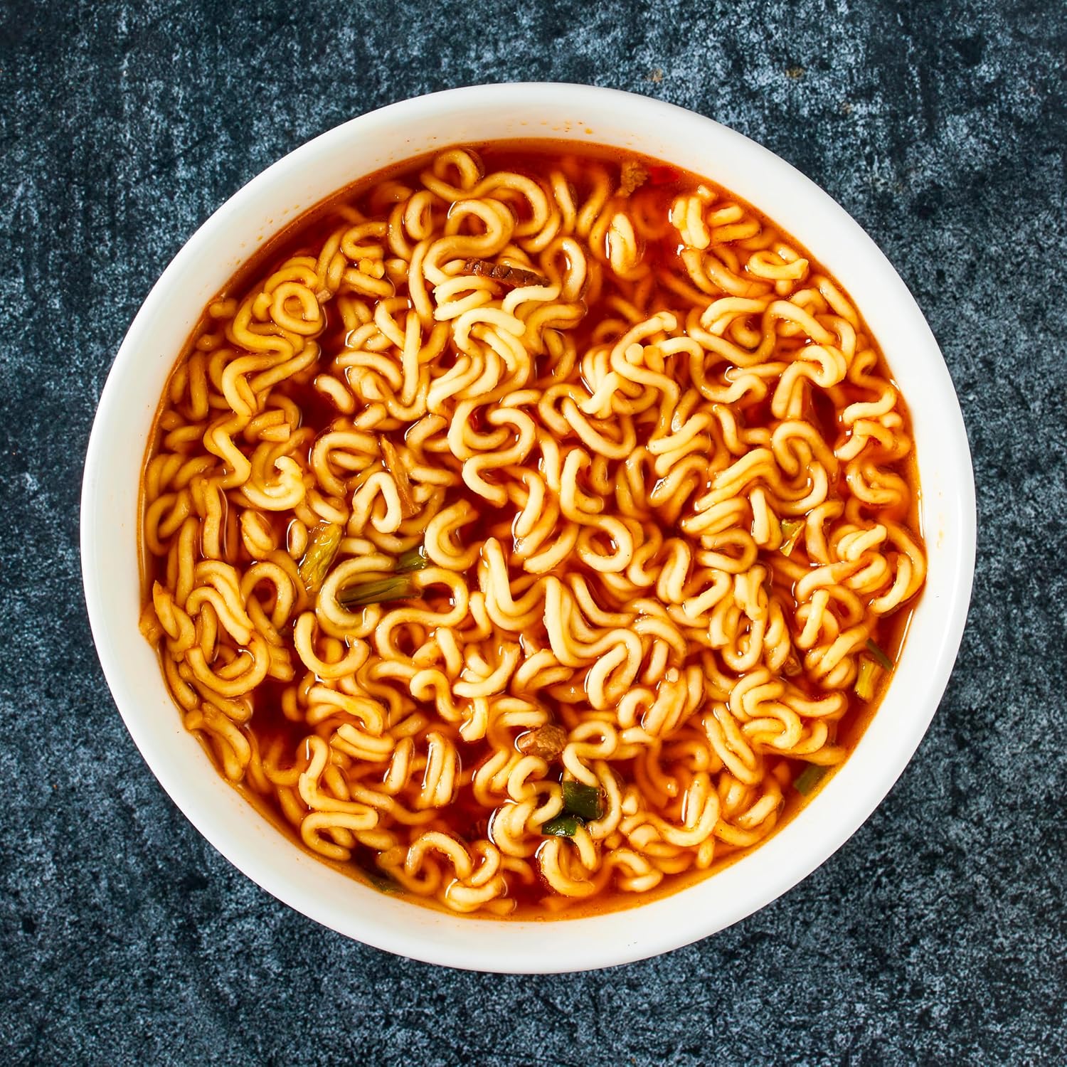 Nongshim Shin Ramyun Noodles, Spicy Korean Signature Instant Ramyun, Rich Beef Flavored Broth, Microwaveable, Korean Instant Noodles, 4.23 oz (Pack of 20), Packaging May Vary.