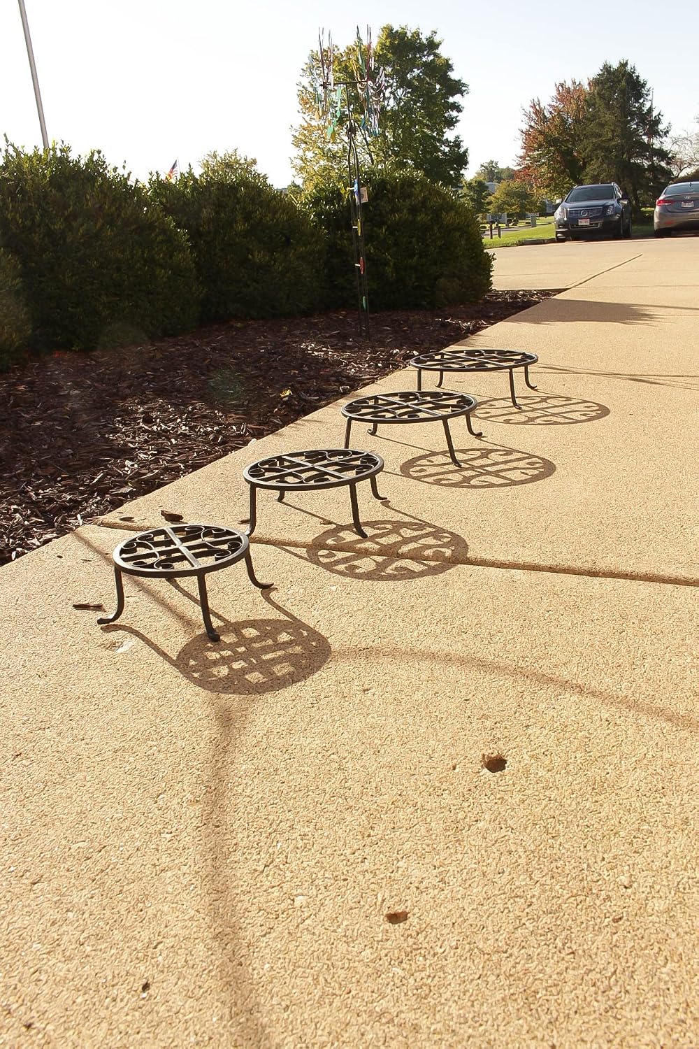 Red Carpet Studios Set of Four Round Black Iron Plant Stands, Scroll Pattern