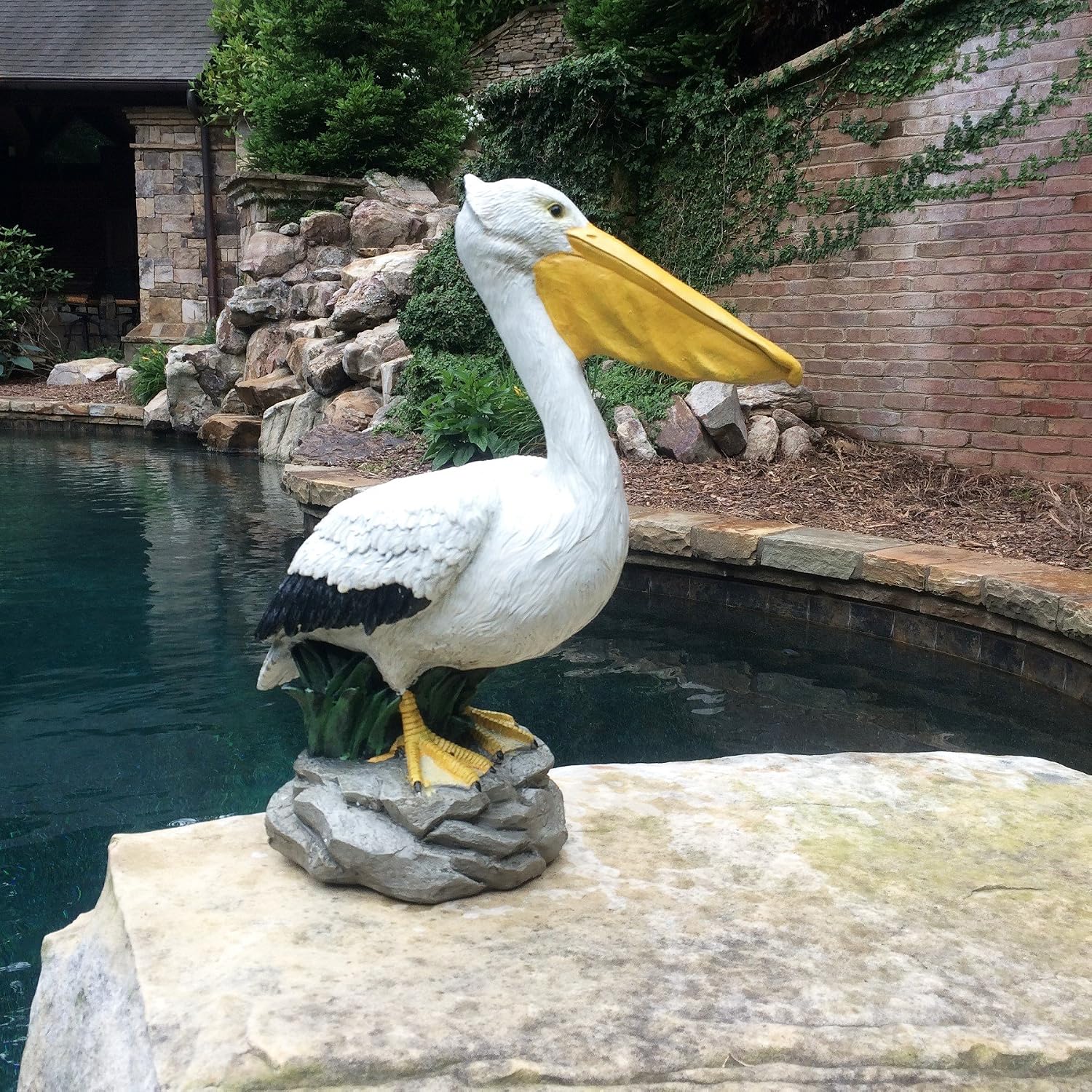 homestyles 20 in. Pelican on Ocean Coastal Rock Collectible Beach Statue-Natural Finish