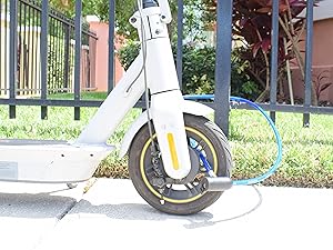 Scooter secured using the DocksLocks security cable with key lock