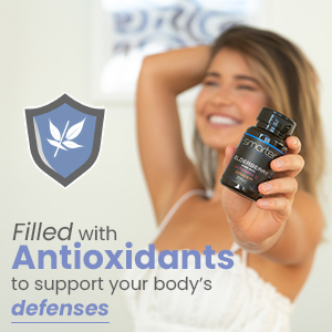 Woman holding Smarter Elderberry, Filled with antioxidants to support your body's defenses