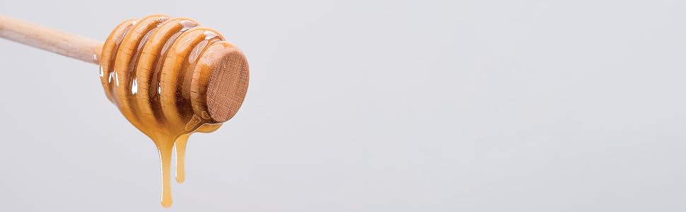 A honey dipper covered in Manuka South Premium New Zealand Manuka Honey