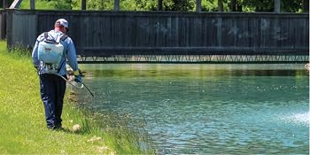 Applying chemical treatment with tank sprayer