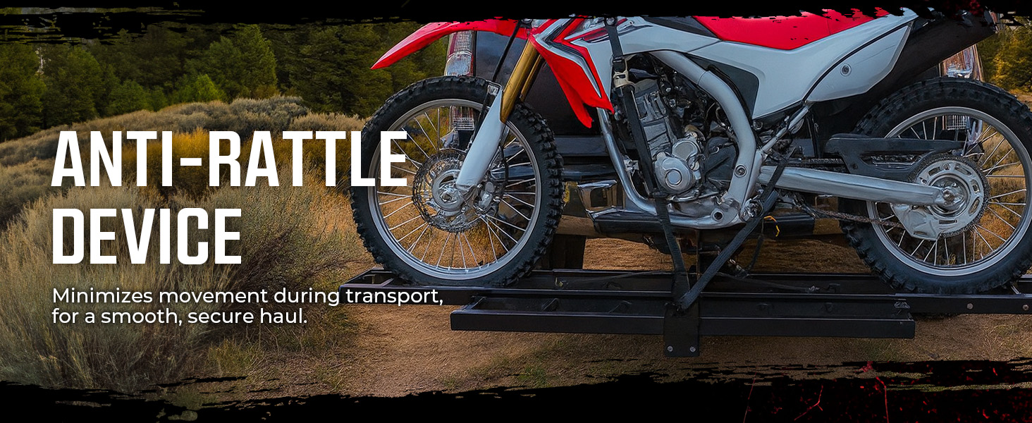 Close-up of motorcycle tire on aluminum dolly showing ride-on, ride-off design and locking caster.