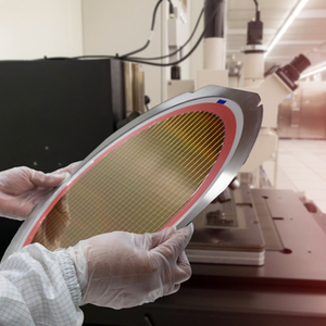 silicon wafer being checked in lab