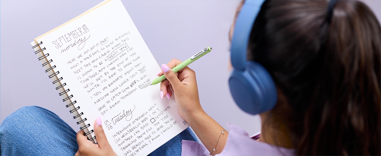 Paper Mate writing on notepad