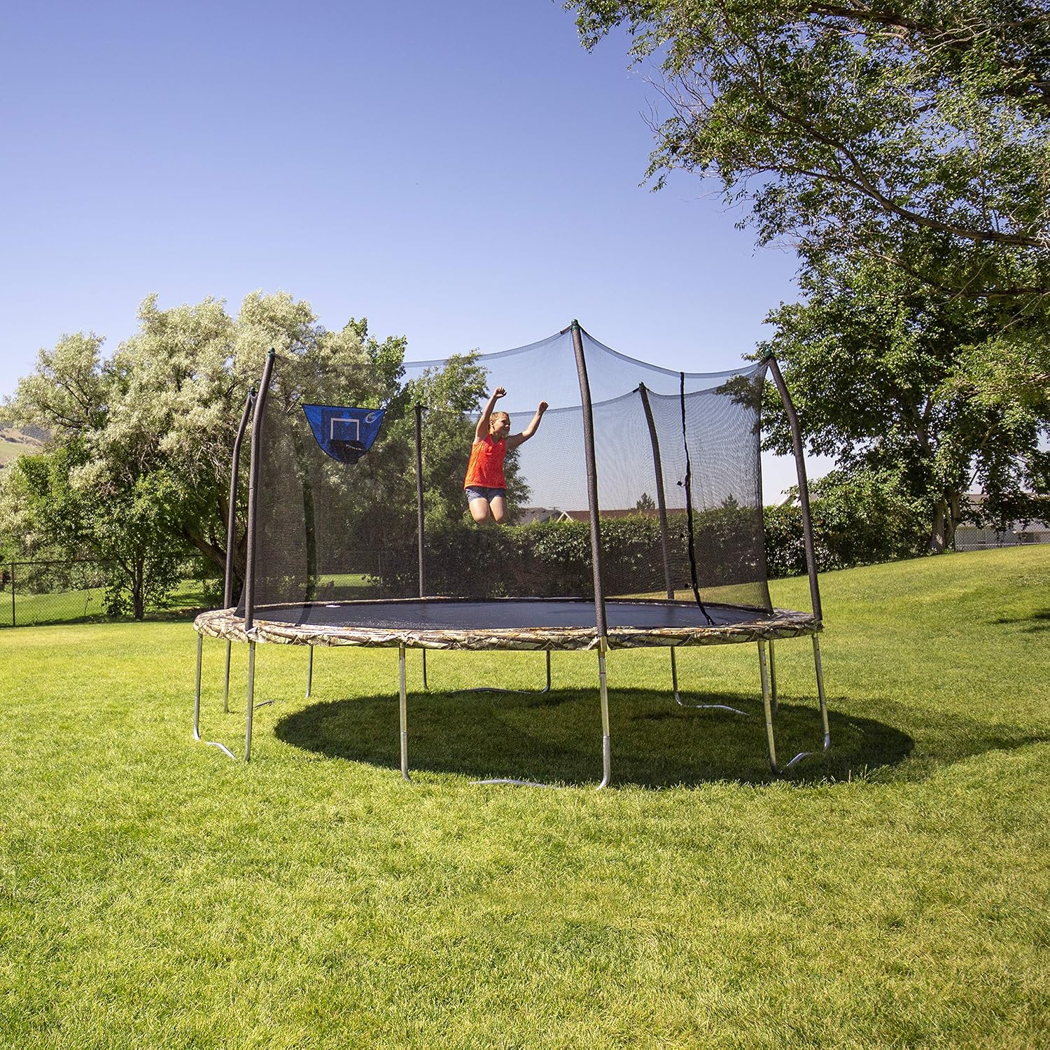 Skywalker Trampoline Outdoor 8 FT, 12 FT, 15 FT Jump N’ Dunk Round Outdoor Trampoline with Net, Trampoline Mat, and Basketball Hoop for Trampoline