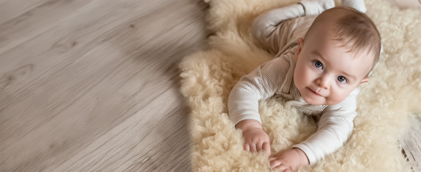 Lifestyle use of lambskin baby rug for stroller, crib, tummy time, and gifting