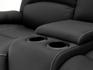 Close up view of cup holder on double recliner.