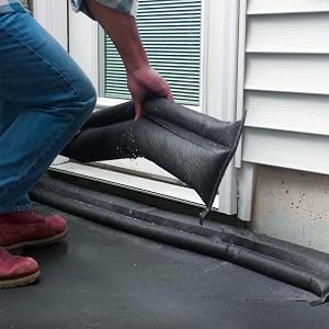 Flood Barriers being stacked in place in front of door