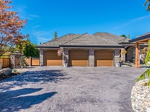 high gloss stamped concrete driveway