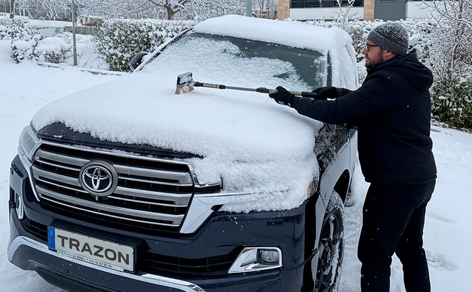 Demonstration of snow removal using a snow brush