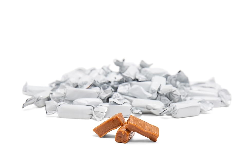WHITE CARAMELS WITH OPEN CARAMELS IN FRONT , white bulk candy