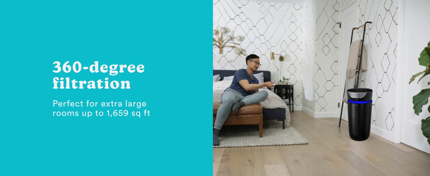 man using remote to control air purifier in bedroom