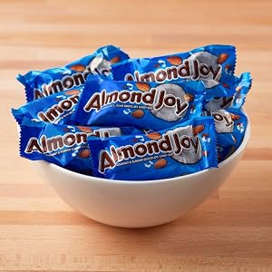 A bowl filled with snack size Almond Joy candy bars