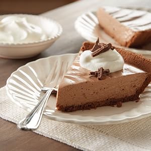 Hershey's milk chocolate pieces broken and sprinkled on a chocolate mousse pie