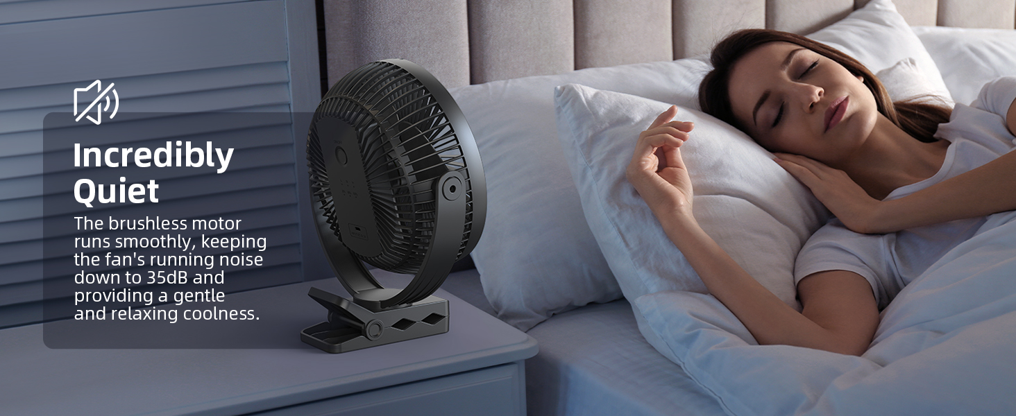 Compact black oscillating fan labeled as 'Incredibly Quiet' next to a bed where someone is sleeping peacefully.