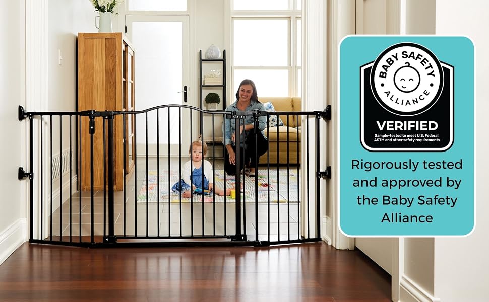 Baby behind gate with baby safety alliance logo