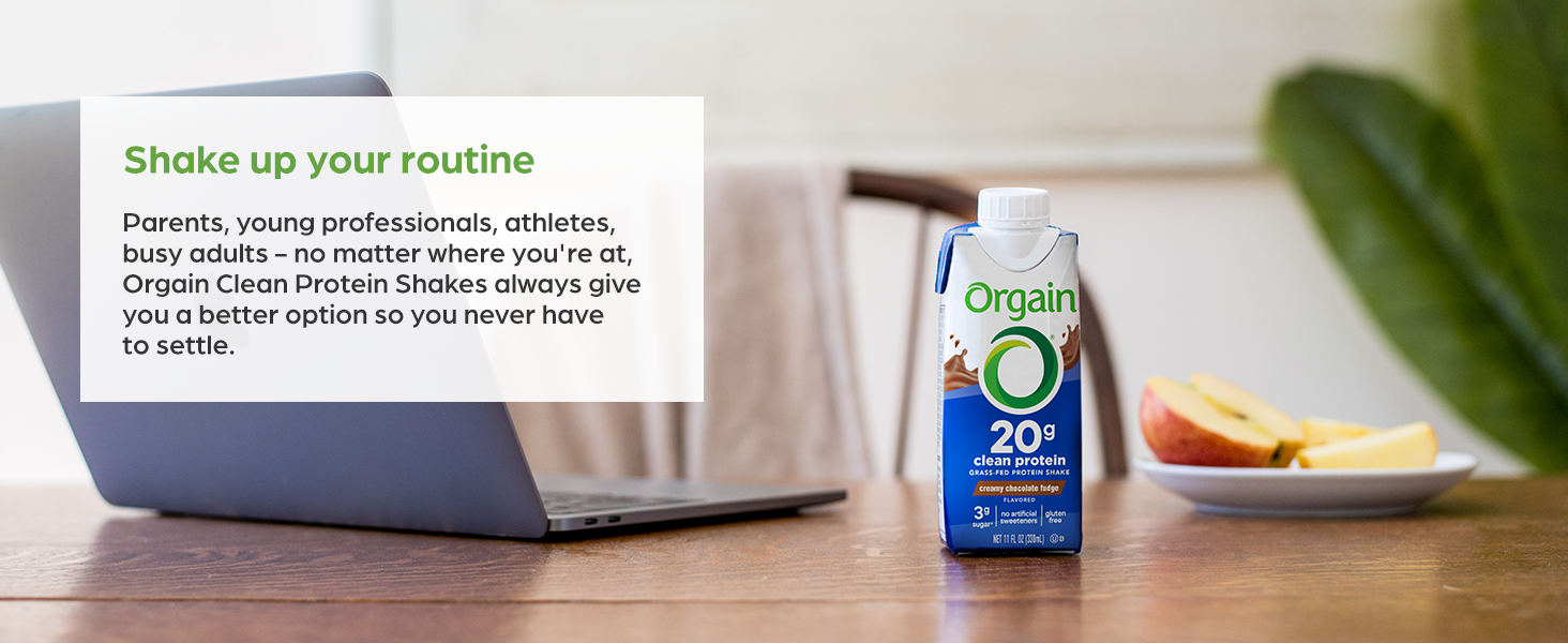orgain shake next to laptop for working