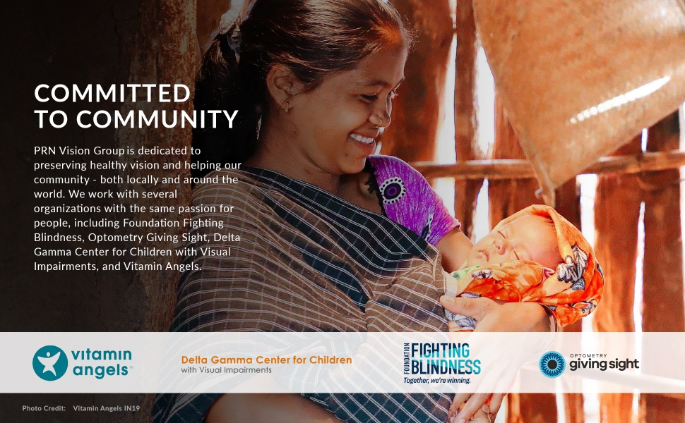 Indian woman holding sleeping infant in traditoinal appareal. Commited to Community